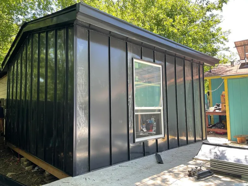 Black standing seam metal wall panels for Metal Roof Installation in Anderson Creek