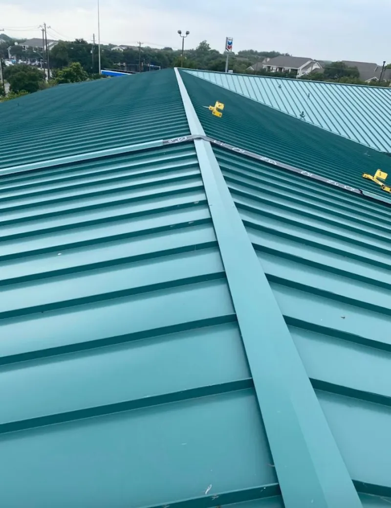 Green commercial metal roof ridge and valley for Metal Roof Repair in Anderson Creek