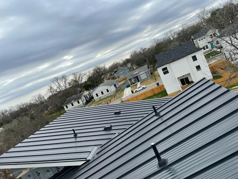 Standing seam metal roof panels with vents for Skylight Repair in Anderson Creek